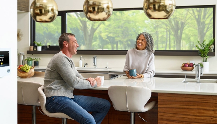 couple sitting in kitchen