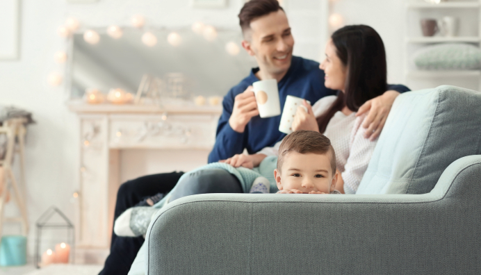 Family sitting on a couch