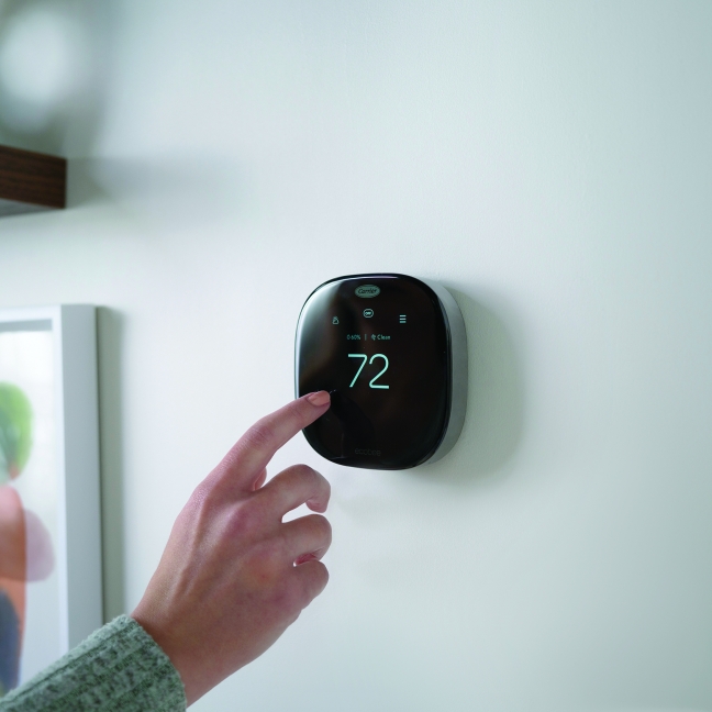 programmable thermostat on the wall