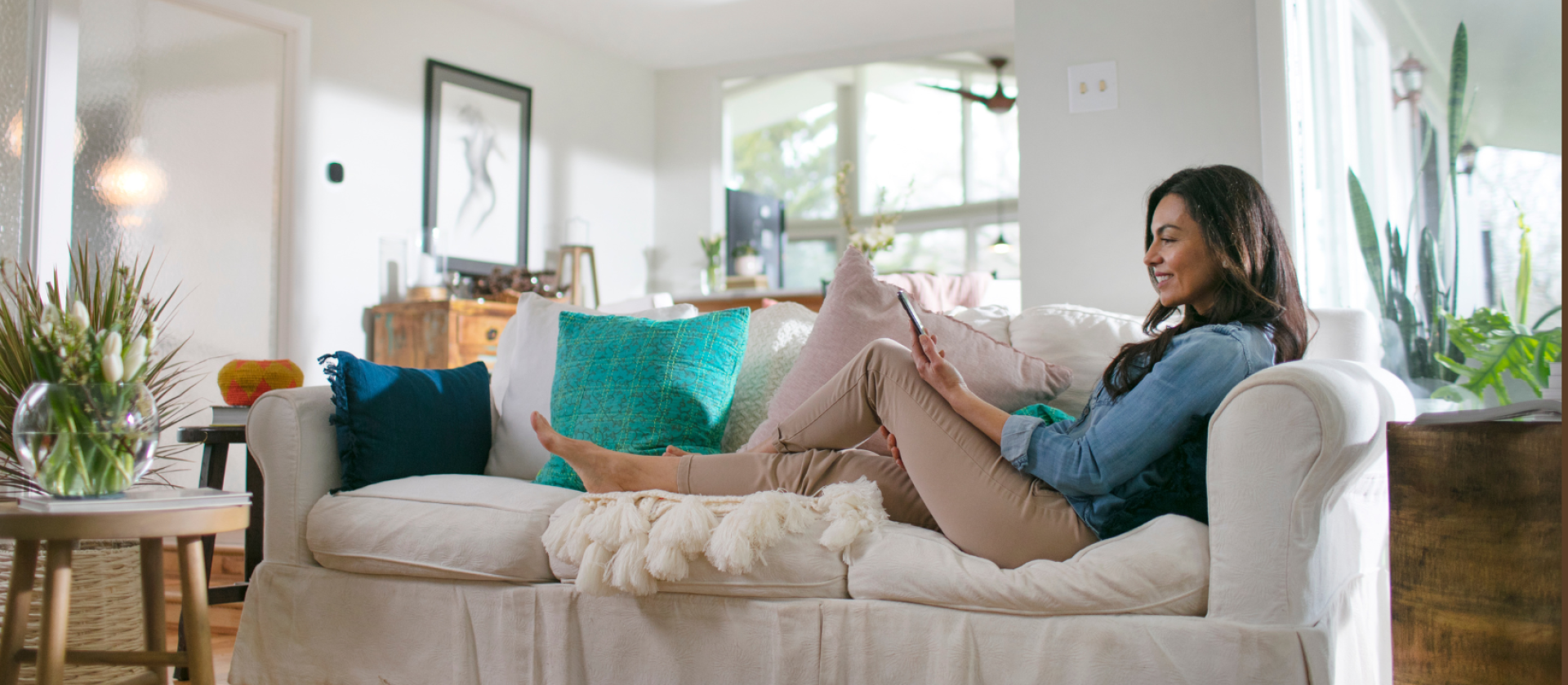 Sitting on the couch reading a book