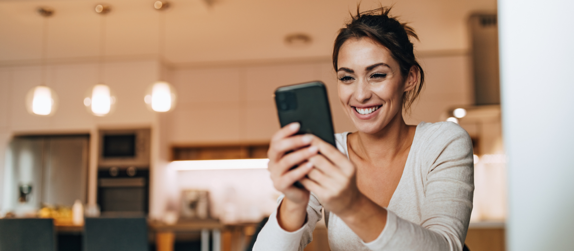 Women on phone scheduling maintenance call on EcoAir's website